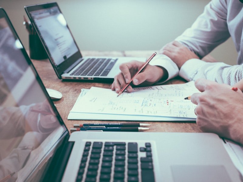 Advisors reviewing pre-process planning documents